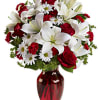 Add some romance to the holiday season with this rich arrangement of