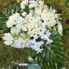 Tall arrangement 
mix flowers roses, hydrangeas, orchids