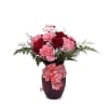 Jarron color rojo o transparente con rosas y claveles y baby Breath