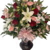 A captivating assortment of mixed florals combined in a captivating vase 