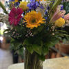 Celebrate good times with this lively bouquet. This arrangement includes seasonal blooms.