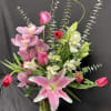Very elegant pink arrangement for any occasion, made with eucalyptus, roses, orchids