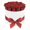 Make them smile with this timeless arrangement of roses delicately designed in