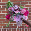Indulge in the timeless elegance of our classic wrapped bouquet, where each