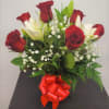 Our premium long stem red roses are an elegant surprise for the