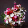Icicles and Roses Limited Edition Winter Holiday Centerpiece

A centerpiece of sugared florals
