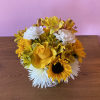 This arrangement is packed full of sunshine and happiness. The perfect arrangement