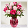 Three tones of pinks in a pink vase. perfect for mothers day.
(Style