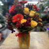 This lovely arrangement is perfect for summer, spring or fall with bright