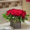 12 rich red roses in a rustic wood box will have your