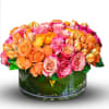 Experience the fiery beauty of this bouquet, featuring orange and pink roses