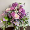 This arrangement is perfect for the purple lover! A substantial piece including