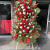 Show support for your loved ones with this elegant red and white