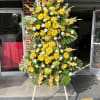 Show support for your loved ones with this vibrant yellow standing spray.
The