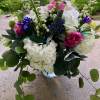 Hydrangea , roses, dalfinium in beautiful spring colors 