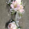 This pink n&#039; white corsage and boutonniere set can be customized for