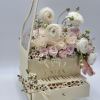 Ranunculus and Rose delicate combination for Spring! This piano box arrangement comes