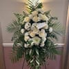 Standing Funeral Spray filled with ivory, white and green blooms adored with