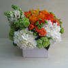  Mix of white hydrangea, roses, ranunculus, viburnum, Star of Bethlehem and