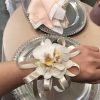 A classic white phalaeposis orchids corsage compliments any outfit. Perfect for prom