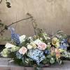 Perfect for a stunning centerpiece or breathtaking gift, this grand arrangement includes