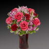 The essence of romance, captured in flowers. Our striking bouquet is gathered
