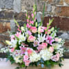 A grand spray of pink and white flowers 