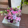 &quot;Enchanting Blossoms&quot; is a captivating floral arrangement that weaves together the delightful