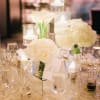 each cylinder has a cluster 
mini calas , roses, hydrangea


