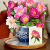 Stunning paper floral bouquet pops open and brings color to any room.
