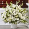 Share a moment of tranquility with this floor basket featuring ivory and