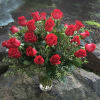 2 Dozen red roses arranged in a vase,  this is quite