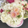 Box of beautiful pink and white hydrangeas, spray roses, garden roses, ranunculus