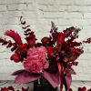 Indulge in a world of enchantment with our &quot;Dark Romance&quot; floral arrangement