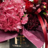 Indulge in a world of enchantment with our &quot;Dark Romance&quot; floral arrangement