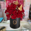 65-70 Red Ecuadorian Roses and Hints of Baby Breath, and butterflies decor.