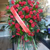 Red is the color of love and this standing spray displays it
