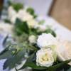 A beautiful floral garland perfect for wedding receptions at an entryway, cake