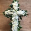 An elegant display of faith and divine peace, this beautiful arrangement will