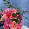 This compact combination of Dahlias, Roses, and Garden roses is packed with