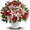 Serenely elegant, this radiant bouquet of fragrant pink lilies and other floral