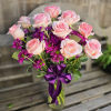 Sweet as can is a lovable bouquet featuring pink roses, purple daisy