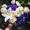 &quot;Purple Rain&quot; Is a Sympathy Arrangement featuring light pink or White roses
