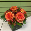 Roses are in perfect harmony in this pretty arrangement that&#039;s sure to