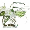 A bold display of white blossoms such as oriental lilies and snapdragons