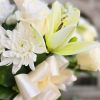 &quot;Lasting Friendship&quot; is an all white sympathy bouquet for the home. This