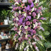 A beautiful floral spray of Pink, Purple and white flowers.