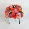 A box full of 16 Premium roses, 8 ranunculus, and greenery 