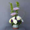 Embrace the elegance of spring with &quot;Pearls &amp; Amethyst,&quot; a breathtaking arrangement