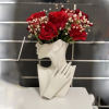 Beautiful handmade floral vase set up with beautiful fresh flowers. This is